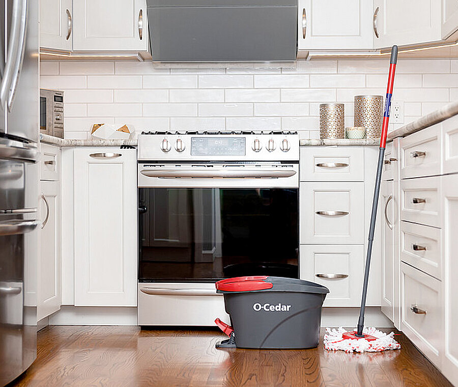 An O'Cedar cleaning bucket in a kitchen